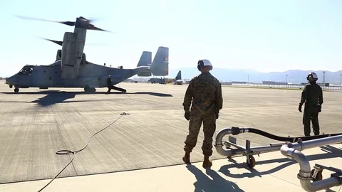 MV-22 Osprey ground running during hot refuel Stock Footage 81660494
