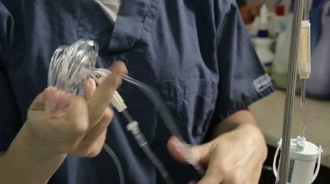 MVI 0594 Preparing infusion on pole Stock Footage 56522866