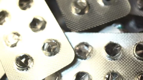 MVI Many empty cold formed aluminium blisters (PVC aluminium foil blister pack). Stock Footage 145374516