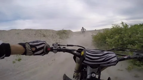 Mx pov sprayed with sand in berm slo mo Stock Footage 52445027