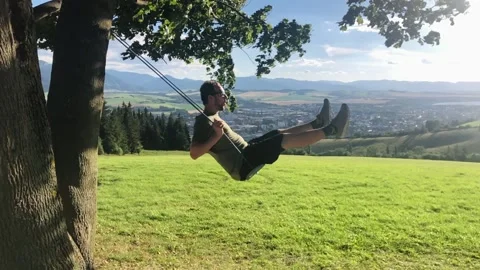 My boyfriend on the swing Stock Footage 176890619