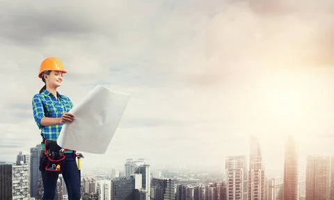 My development plan Engineer woman with blueprint on modern city landscape... Stock Photos