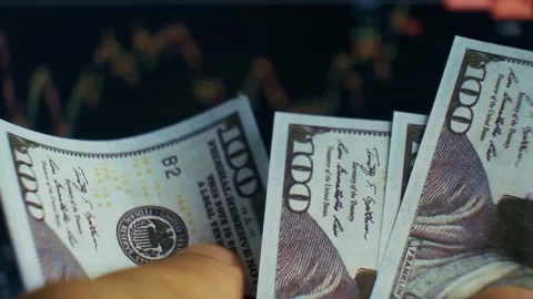 My hands are counting several hundred dollar bills Stock Footage 329953971
