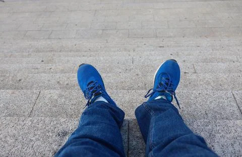 My Point of View when Sitting on the Steps with Relaxed Legs Stock Photos