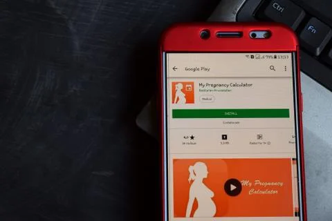 My Pregnancy Calculator dev app on Smartphone screen. Stock-Fotos