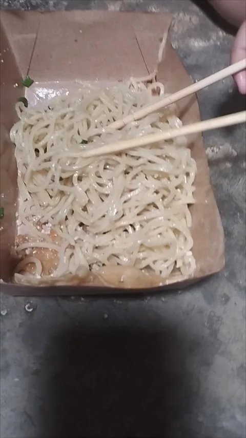 My son eats gacoan noodles Stock Footage 295014374