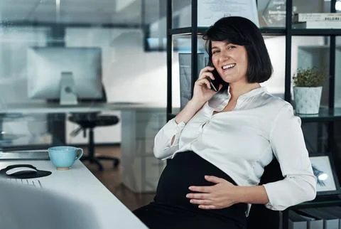 My third trimester wont stop me from working. an attractive pregnant Stock Photos