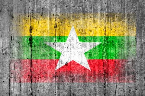 Myanmar flag painted on background texture gray concrete Foto stock