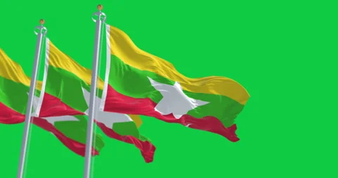 Myanmar national flags waving in the wind isolated on green background Stock Footage 310447344