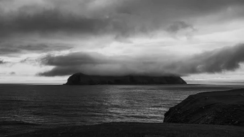 Mykines island under the clouds view from Bour B&amp;W 4k timelapse, Faroe Islands Stock Footage 131741212