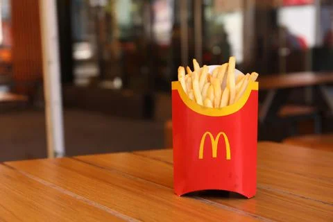 MYKOLAIV, UKRAINE - AUGUST 11, 2021: Big portion of McDonald's French fries o Stock Photos