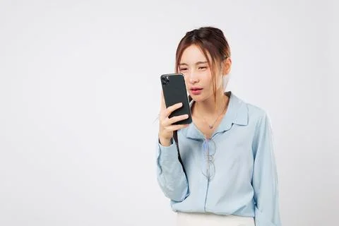 Myopia vision decline. Myopia causes eye problem in Asian woman who looks c.. Stock Photos