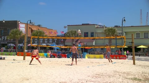 Myrtle Beach SC Attractive Men Playing Volleyball Stock Footage 80541332