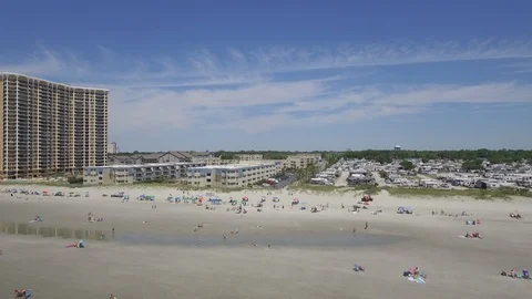 Myrtle Beach summer flying drone down beach Stock Footage 127518075