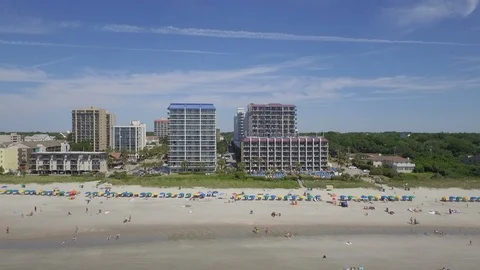 Myrtle Beach summer flying drone down beach Video stock 127518077