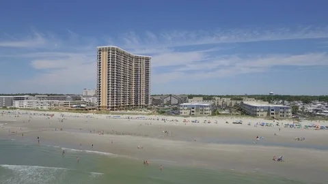 Myrtle Beach summer flying drone down beach Stock Footage 127518080