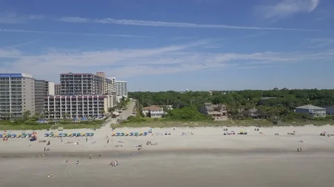 Myrtle Beach summer flying drone down beach Stock Footage 127518088