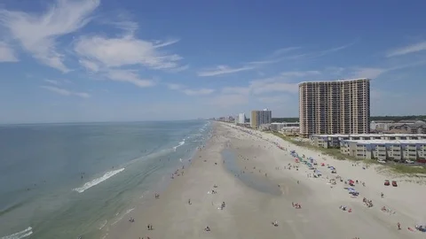 Myrtle Beach summer flying drone down beach Stock Footage 127518111