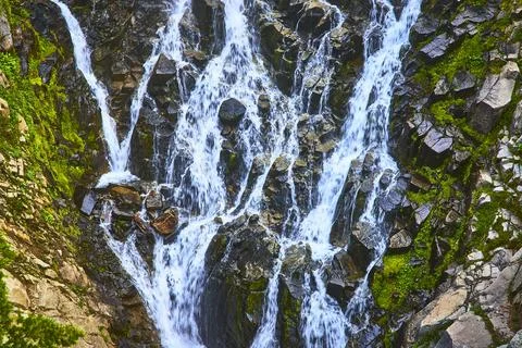 Myrtle Falls Waterfall Cascading Over Mossy Rocks in Mount Rainier National.. Stock Photos