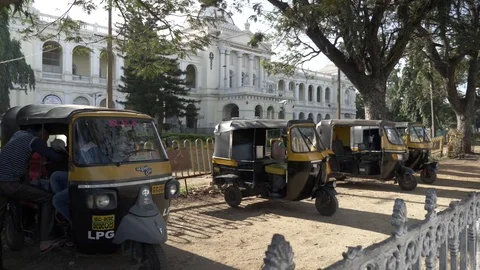MYSORE, India - Auto Rickshaws parked outside the Krishnara Jendra Hospital Stock Footage