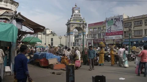 MYSORE, India - crowds move around vegetable stalls and The Dufferin Clock Tower Video stock 84177810