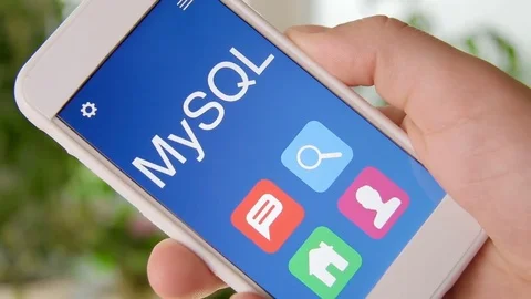 MySQL concept application on the smartphone. Man uses mobile app. Stock-Footage 77410658