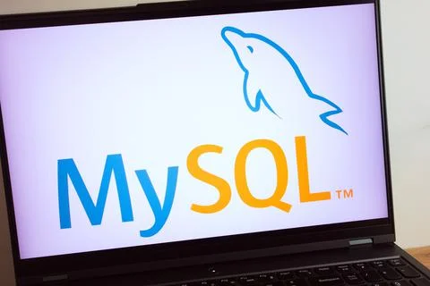 MySQL relational database management system logo on laptop Stock Photos