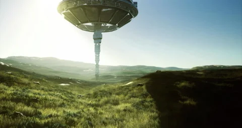 Mysterious alien ship descends upon lush extraterrestrial landscape at dawn Stock Footage 314342582