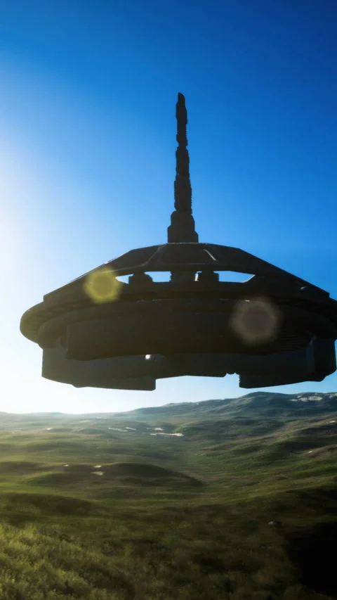 Mysterious alien ship hovers over a serene landscape at sunset Stock Footage 324500441