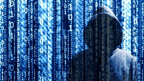 Mysterious anonymous hacker in hood with binary digits scrolling Video stock 109199698