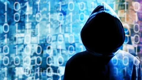 Mysterious anonymous hacker in hood with binary digits scrolling 스톡 동영상 112040169