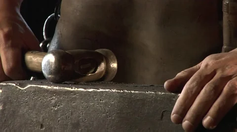 Mysterious blacksmith forges a stem. Stock Footage 49393761