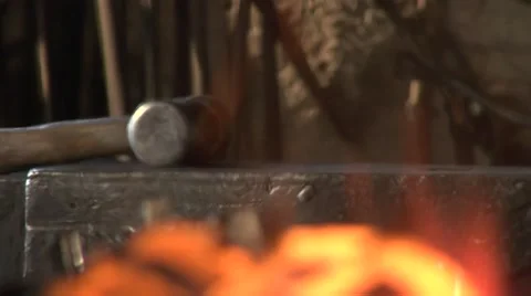 Mysterious blacksmith forges a torch. Stock Footage 49398848