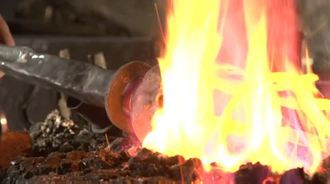 Mysterious blacksmith forges a torch. Stock Footage 49401277