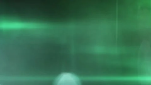 Mysterious bright green light leaks and | Stock Video | Pond5