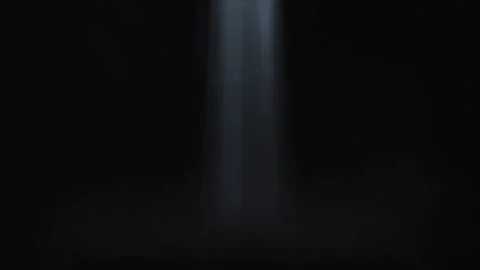 Mysterious dark background with subtle light beams emerging from above Stock Footage 295324150