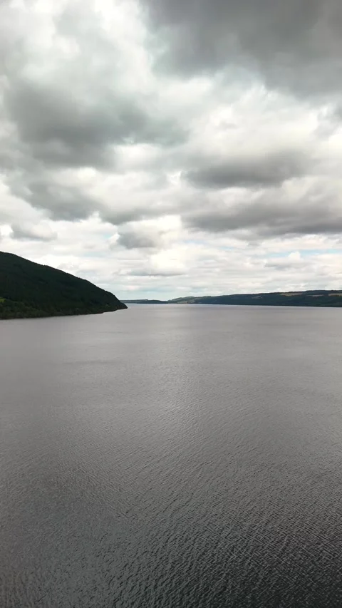 Mysterious Deep Blue Waters of Loch Ness Aerial View Stock Footage 330665277