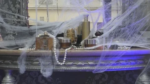 Mysterious dressing table with spider web on Halloween Stock Footage 69848336