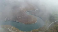Mysterious Drone Flight Through Fog Reveals Beautiful Natural Landscape Stock Footage