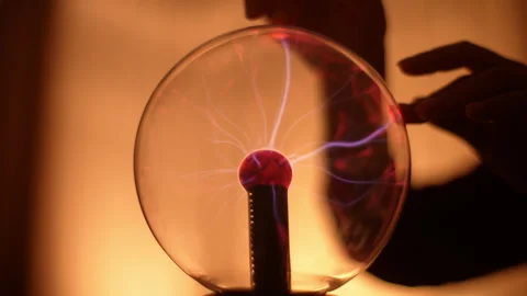 Mysterious fortune teller performing ritual with magic electrical ball for Stock Footage 276370126