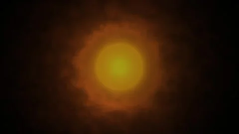 Mysterious glowing light orb in orange yellow through dark smoke abstract l.. Stock Footage 321445088