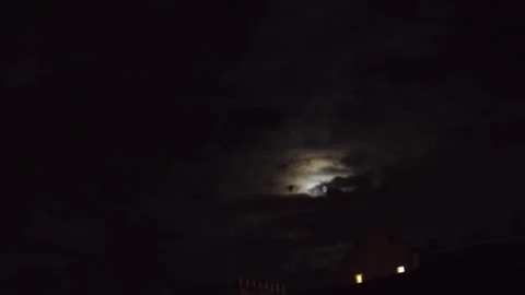 Mysterious Glowing Moon in Dark Sky Stock Footage 346205663