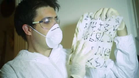 Mysterious language scientist discuss alien heiroglyphs Stock Footage 11964214