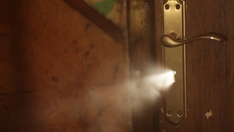 Mysterious Light Through Keyhole Stock Footage 82954105