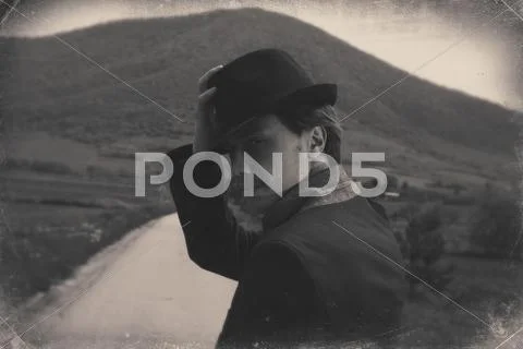 Mysterious man on the road. black and white retro style imagery Stock Photos