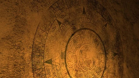 A mysterious Mayan or Aztec seal on cave wall with candlelight illumination ALT Stock Footage 100946456