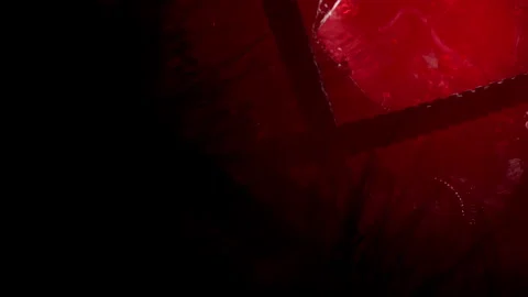 Mysterious Shadows and Vibrant Red Hues Create an Intriguing Visual Experience Stock Footage 344951848