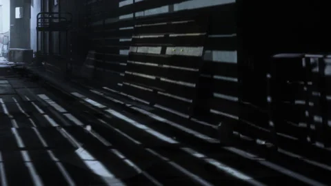 Mysterious Shadows Dance Across a Dimly Lit Alleyway Filled With Intrigue Video stock 344520202
