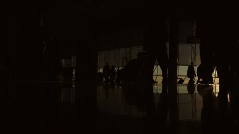 Mysterious Shadows in Dimly Lit Space Evoke Intriguing Thoughts and Captivate Stock Footage 295746329