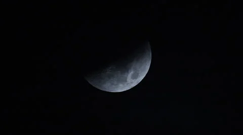 A Mysterious Silver Moon Hangs In The Pitch Black Night Sky. Stock Footage 50954853